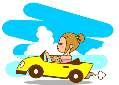 車を運転する若い女性